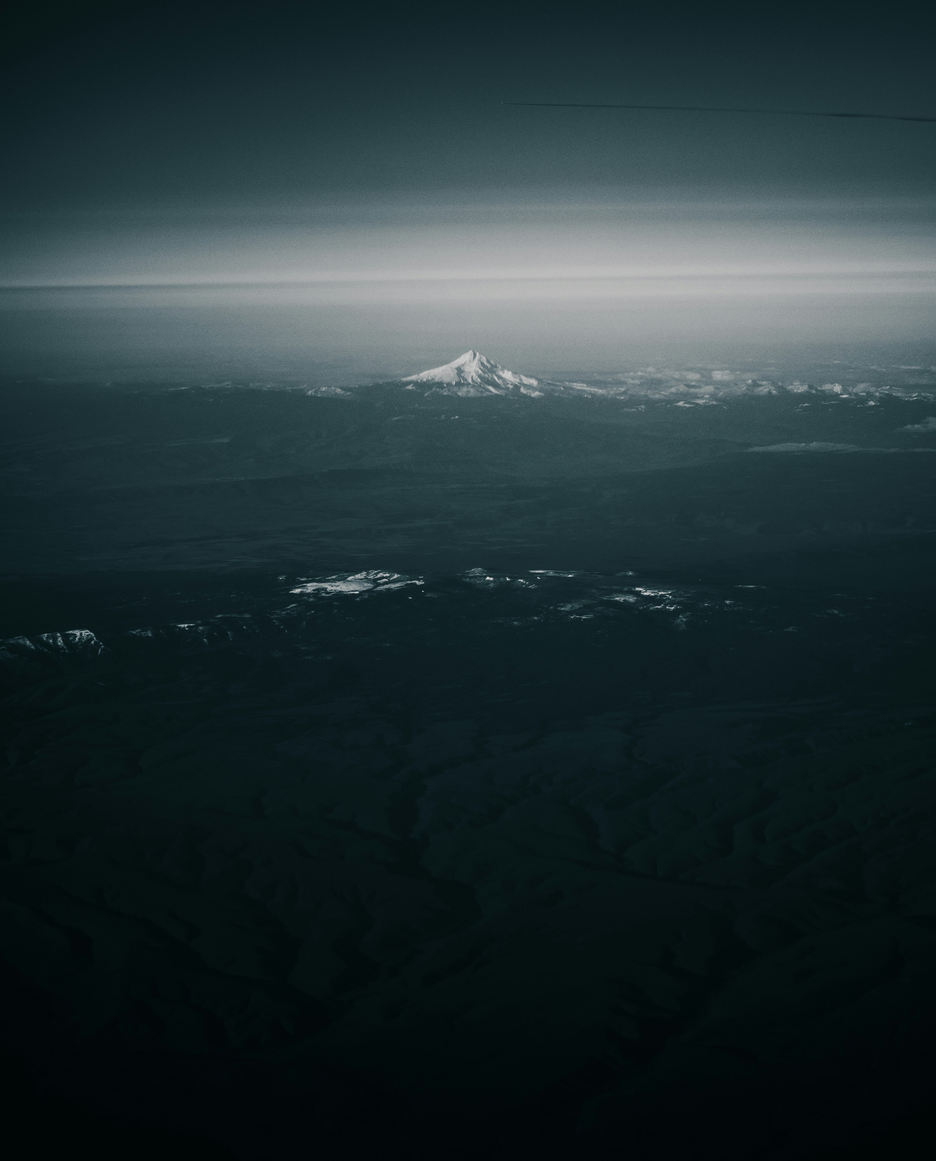 aerial view of snow covered mountain during daytime